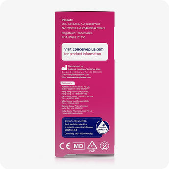 For Conceive Plus Maximum Fertility Bundle, image of side panel of 8x4g pre-filled fertility lubricant applicators box, listing international distributor contacts, manufacturer details, patents, FDA registration, and quality assurance metrics including pH and osmolality standards on a magenta gradient background.
